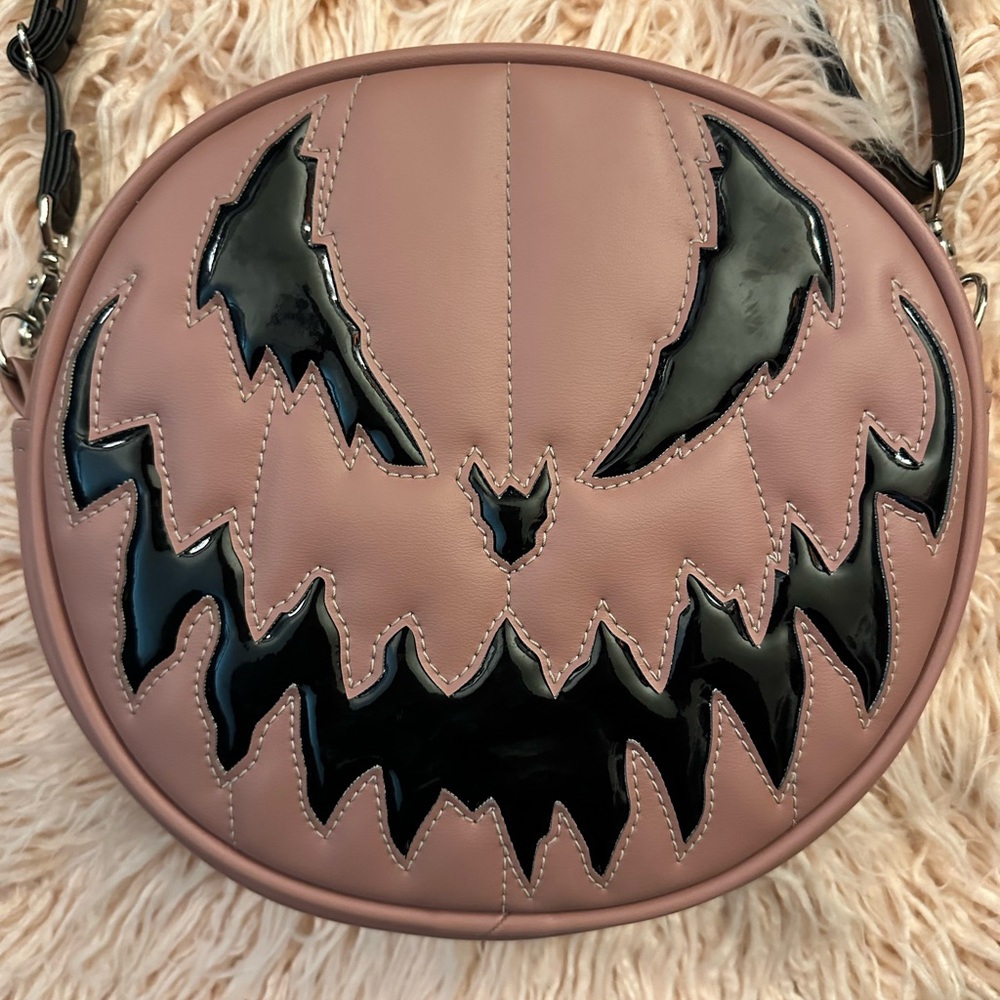 Love Pain & Stitches mauve/black pumpkin bag